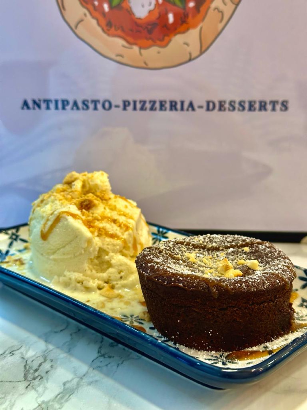 Dark chocolate fondant with a scoop of vanilla gelato